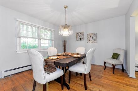After: Showing hardwood flooring in a dining room will attract buyers