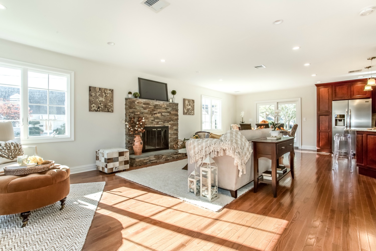 staged living room with updated fireplace mantel