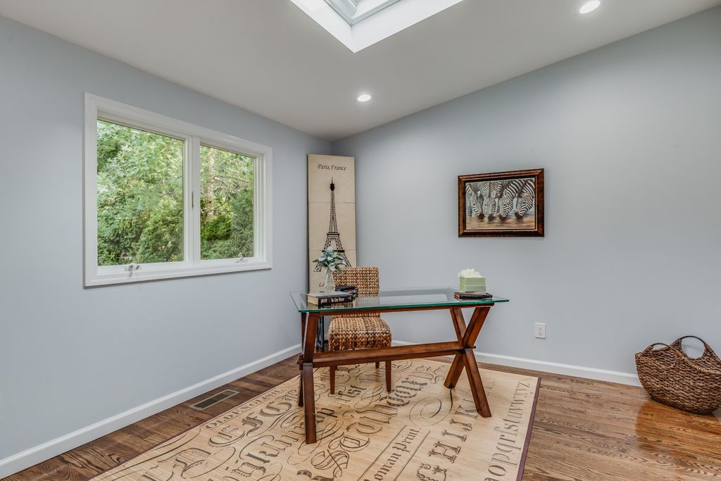 a bonus room staged as an office in Roslyn Heights NY