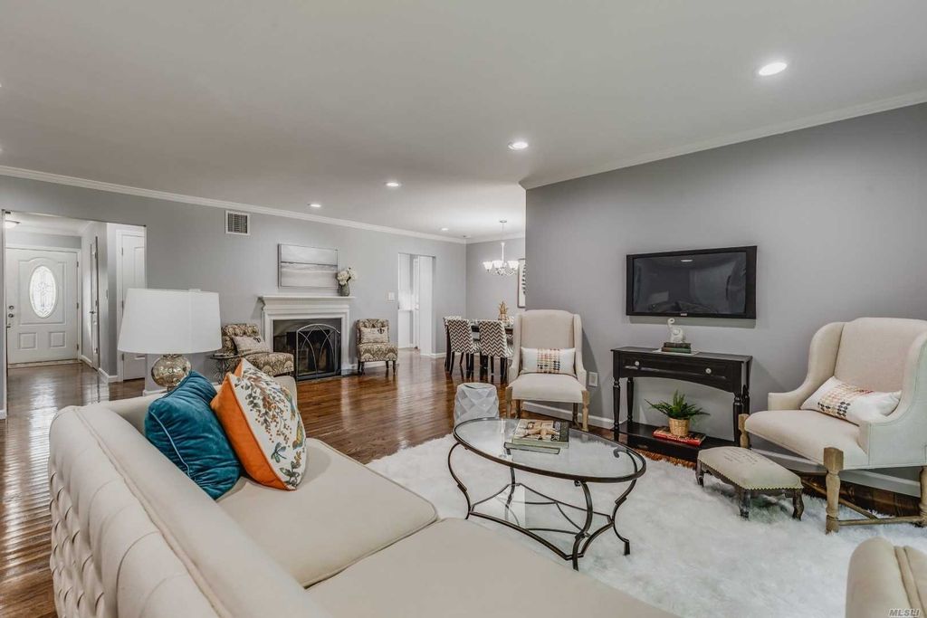 Open Concept Living room, Fireplace and Dining Area