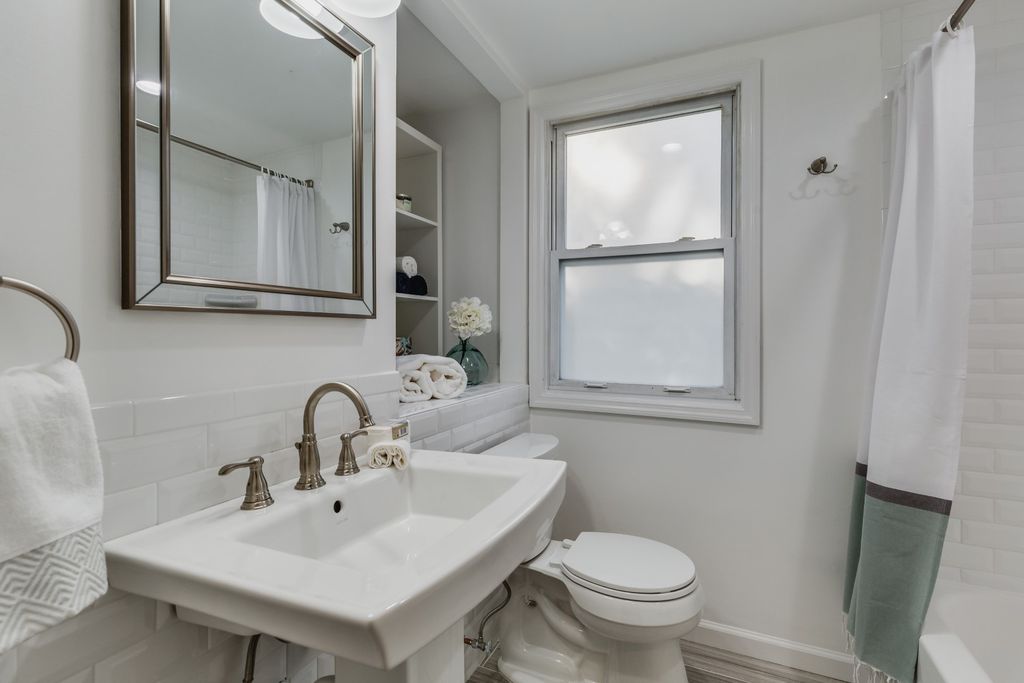 Upstairs bath staged Peachtree Lane in Roslyn Heights NY